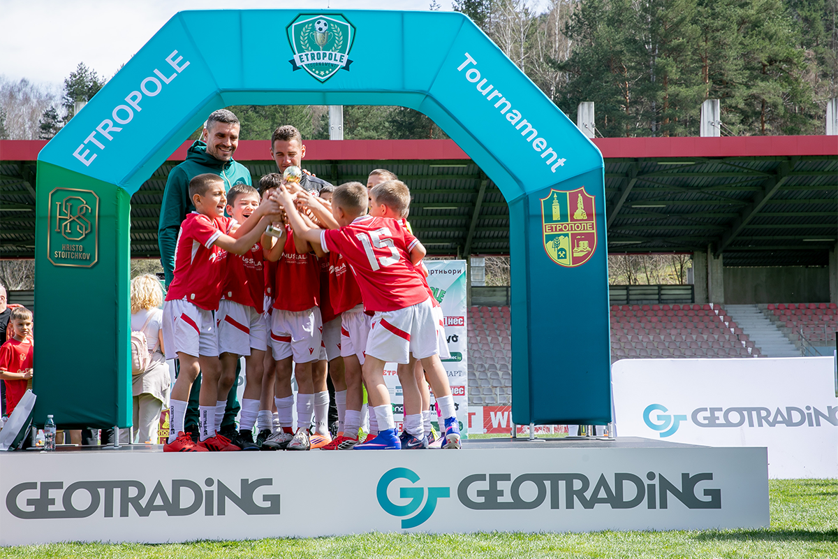 Children celebrate victory in the Etropole tournament with Ms. Rumyana Ivanova.