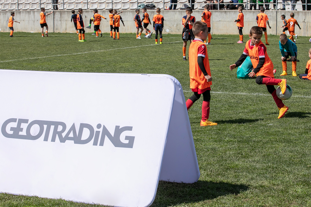 Children playing football at the tournoment.